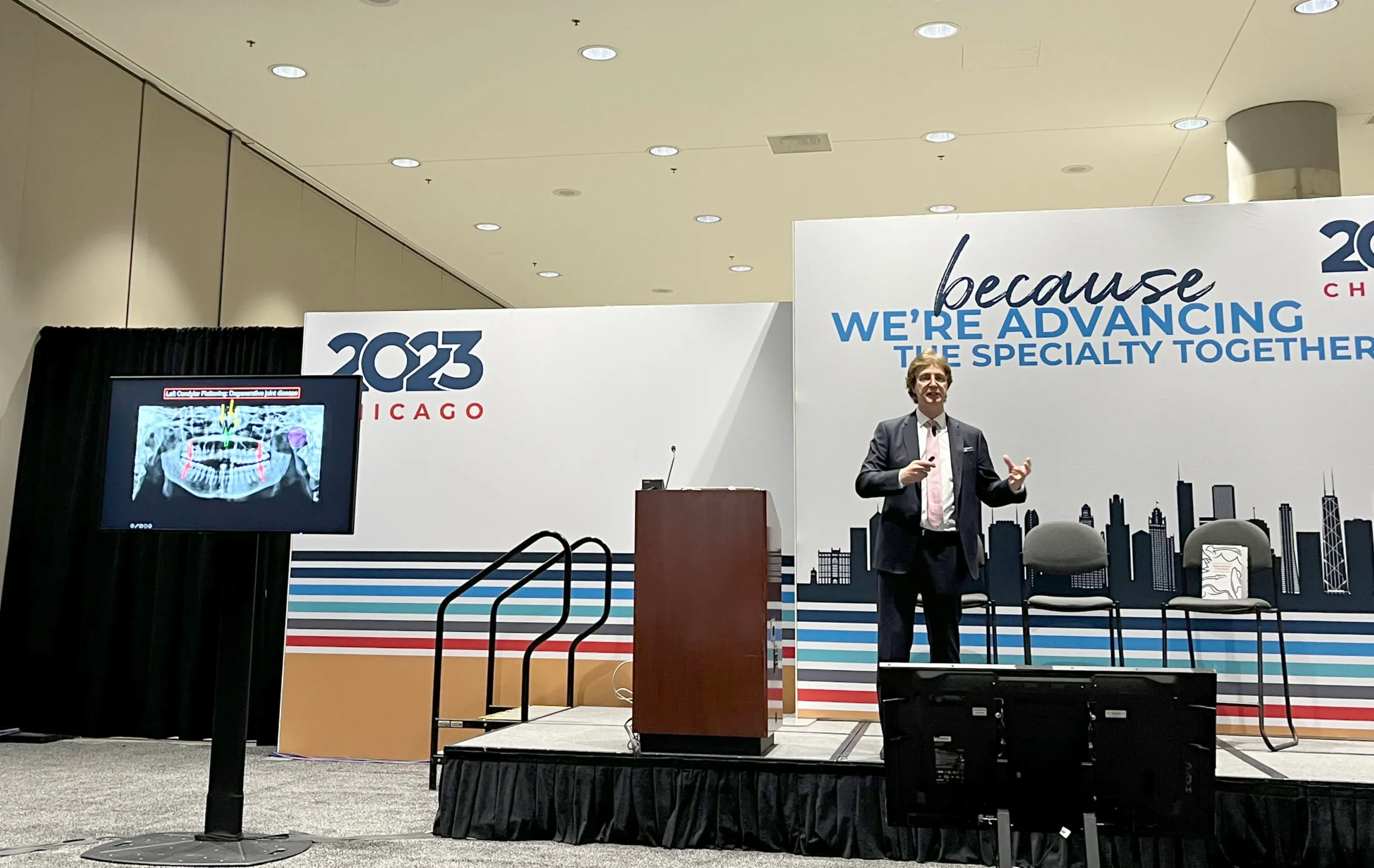 Dr. John Voudouris at a conference